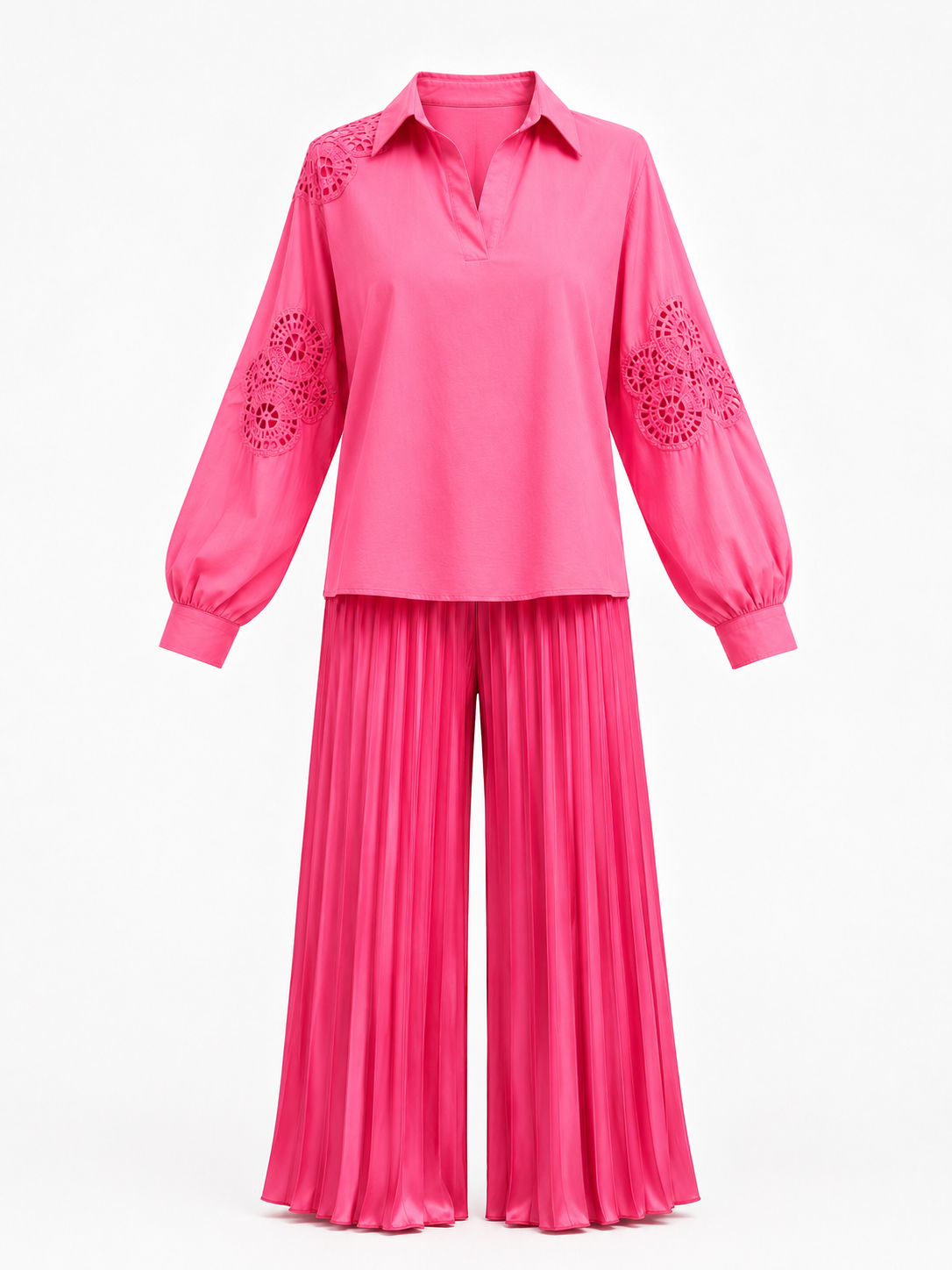 Pink outfit with embroidered details on a white background